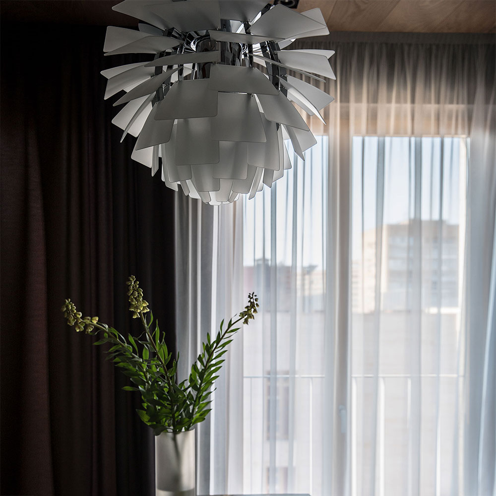 PH Artichoke Glass Pendant Light in living room.