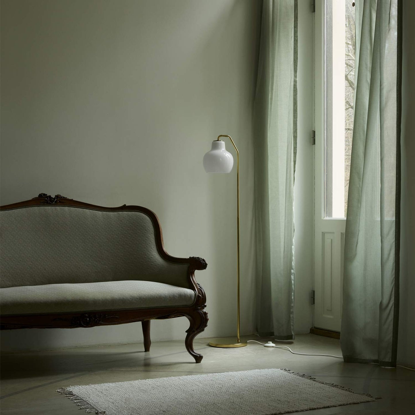 VL Ring Crown Floor Lamp in living room.