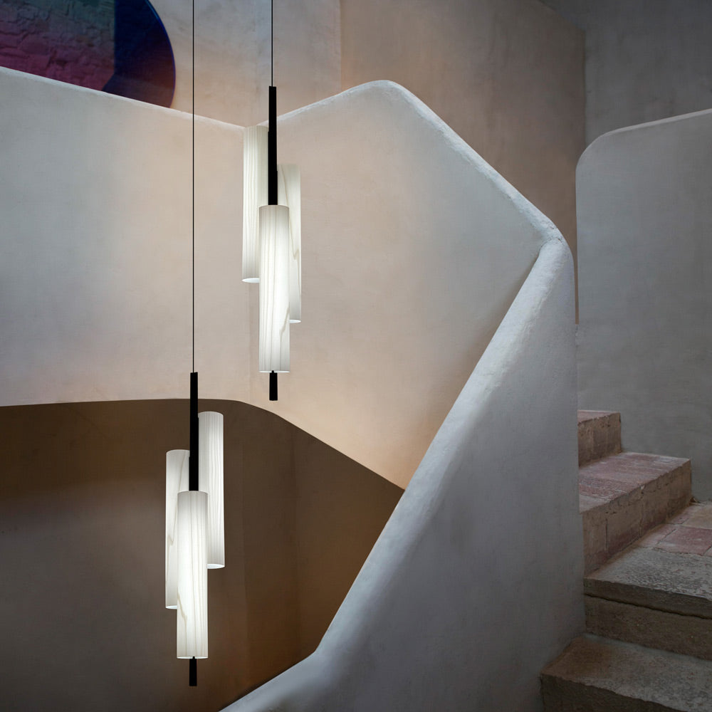 Black Note LED Triplet Pendant Light in stairway.