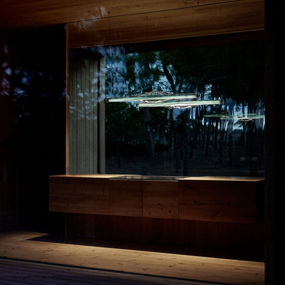 Dune LED Linear Pendant Light in living room.