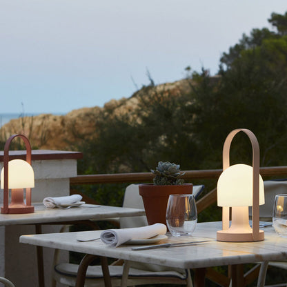 FollowMe LED Portable Table Lamp in Outside Area.