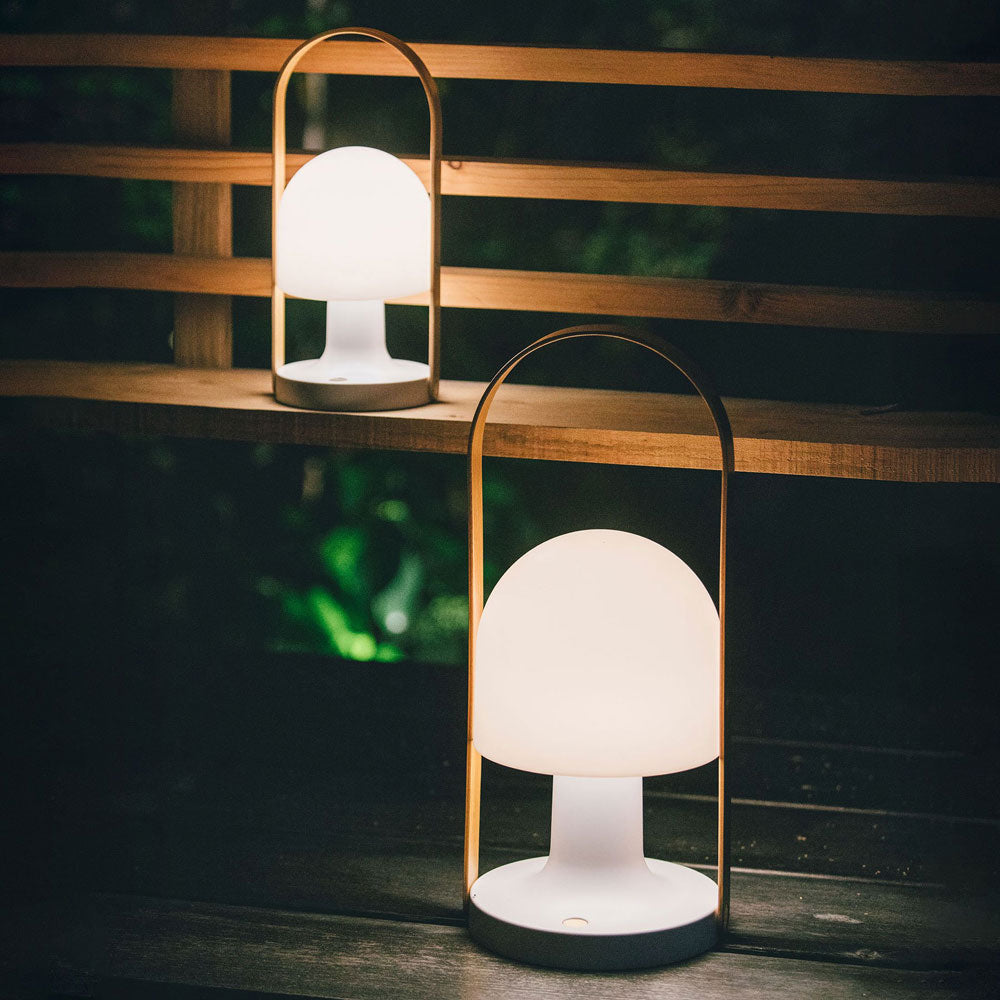 FollowMe LED Portable Table Lamp in Outside Area.