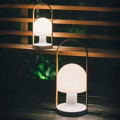 FollowMe LED Portable Table Lamp in Outside Area.
