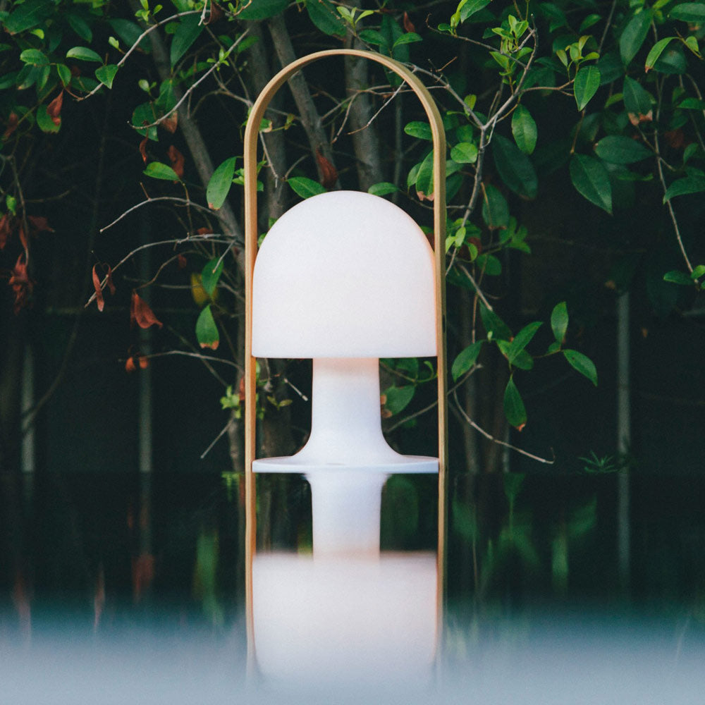 FollowMe LED Portable Table Lamp in Outside Area.