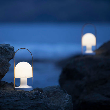 FollowMe LED Portable Table Lamp in Outside Area.