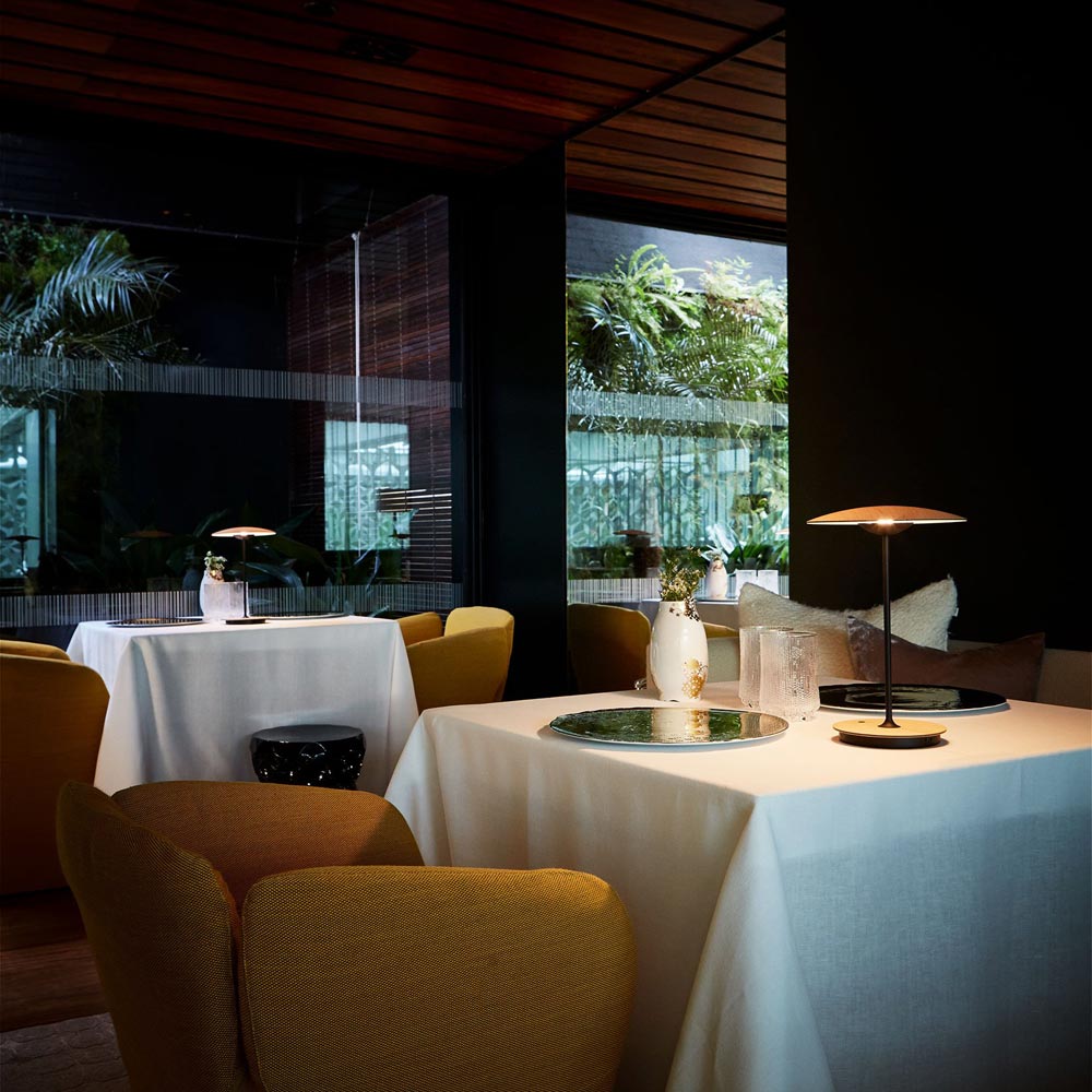 Ginger LED Portable Table Lamp in restaurant.