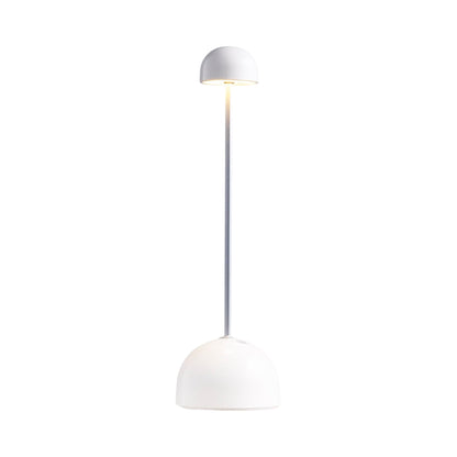Sips Outdoor LED Potable Table Lamp in White/Silver.