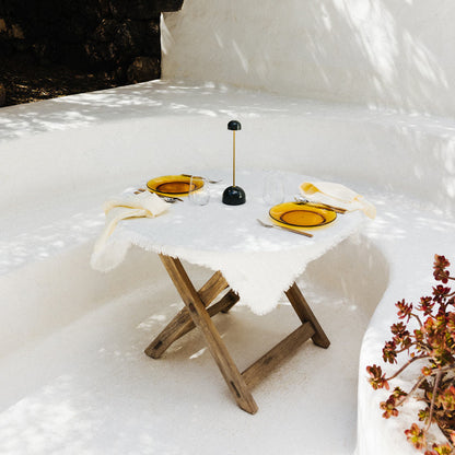 Sips Outdoor LED Potable Table Lamp in Outside Area.