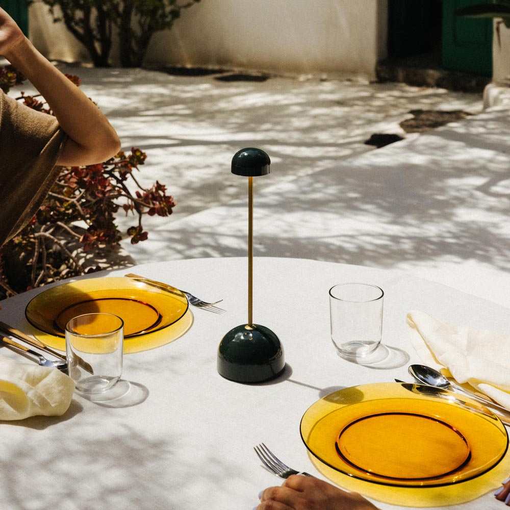 Sips Outdoor LED Potable Table Lamp in Outside Area.