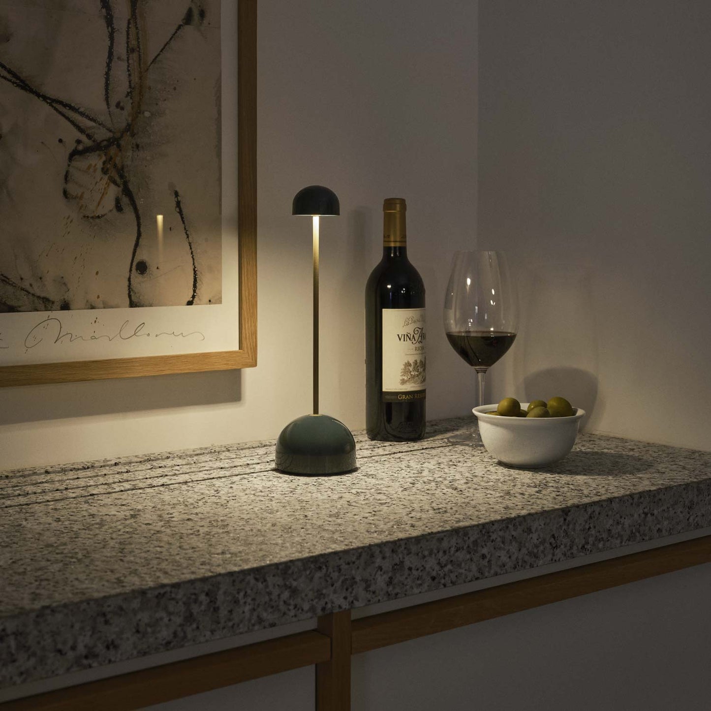 Sips Outdoor LED Potable Table Lamp in restaurant.