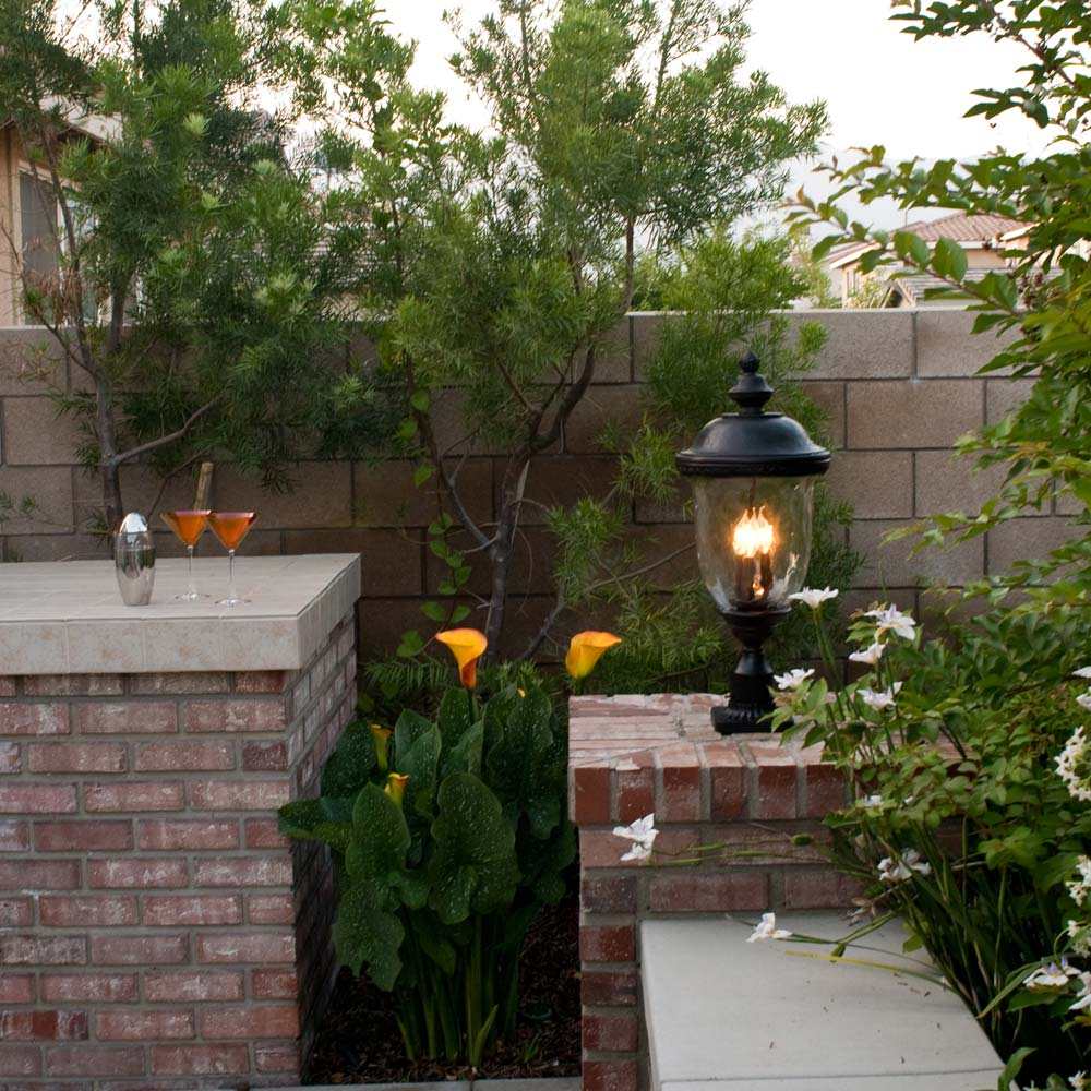 Carriage House Outdoor Clear Glass Wall Light in Outside Area.