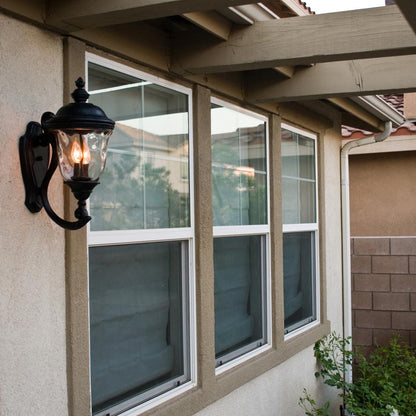 Carriage House Outdoor Clear Glass Wall Light in Outside Area.