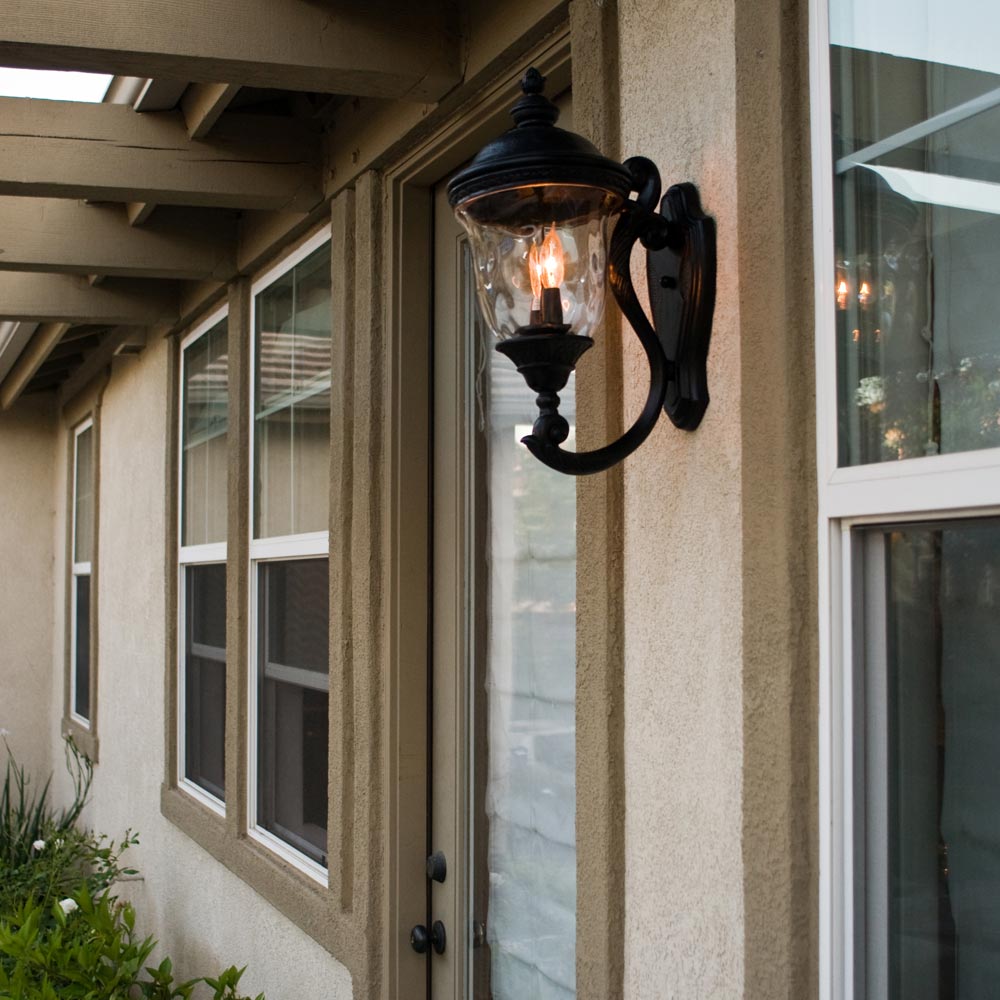 Carriage House Outdoor Clear Glass Wall Light in Outside Area.