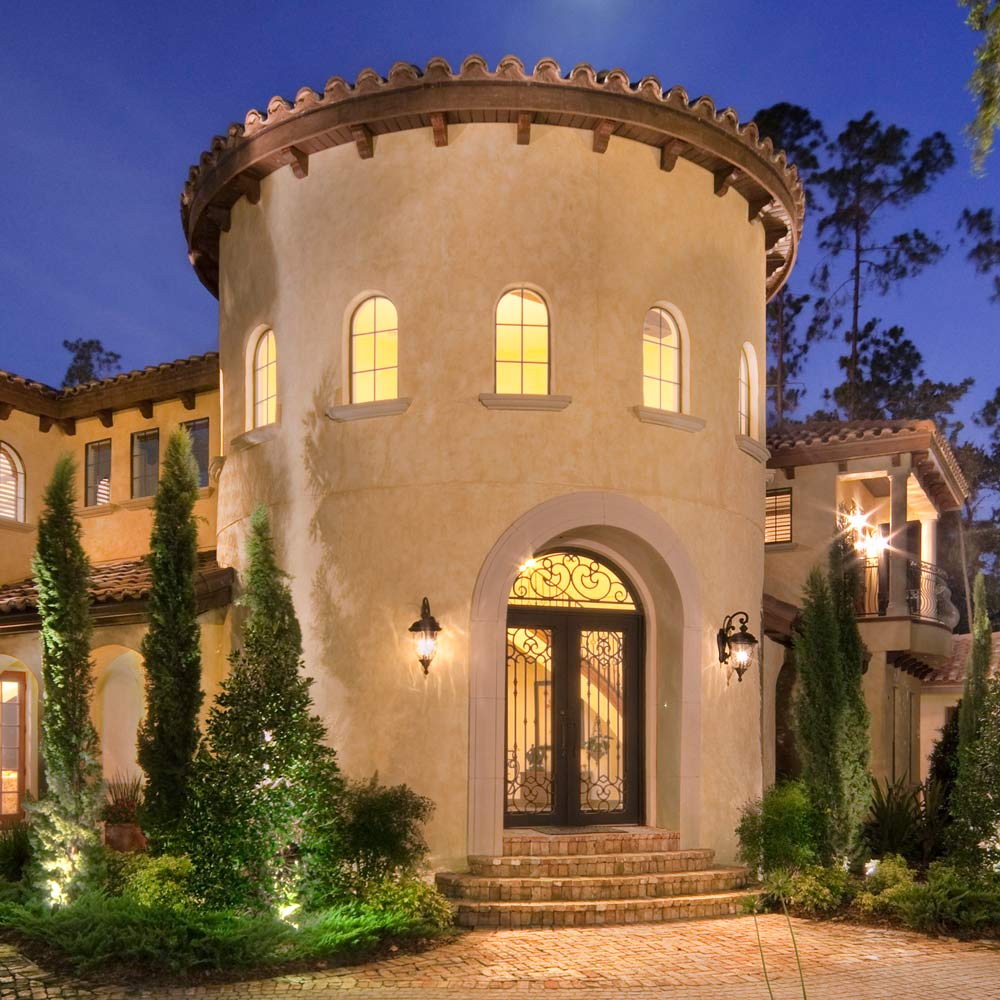Carriage House Outdoor Glass Lantern Wall Light in Outside Area.