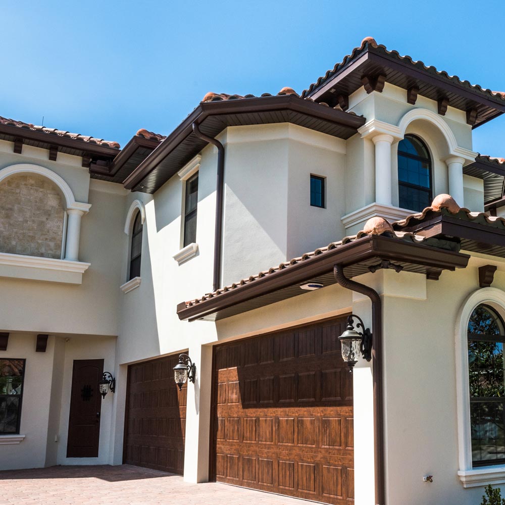 Carriage House Outdoor Glass Lantern Wall Light in Outside Area.
