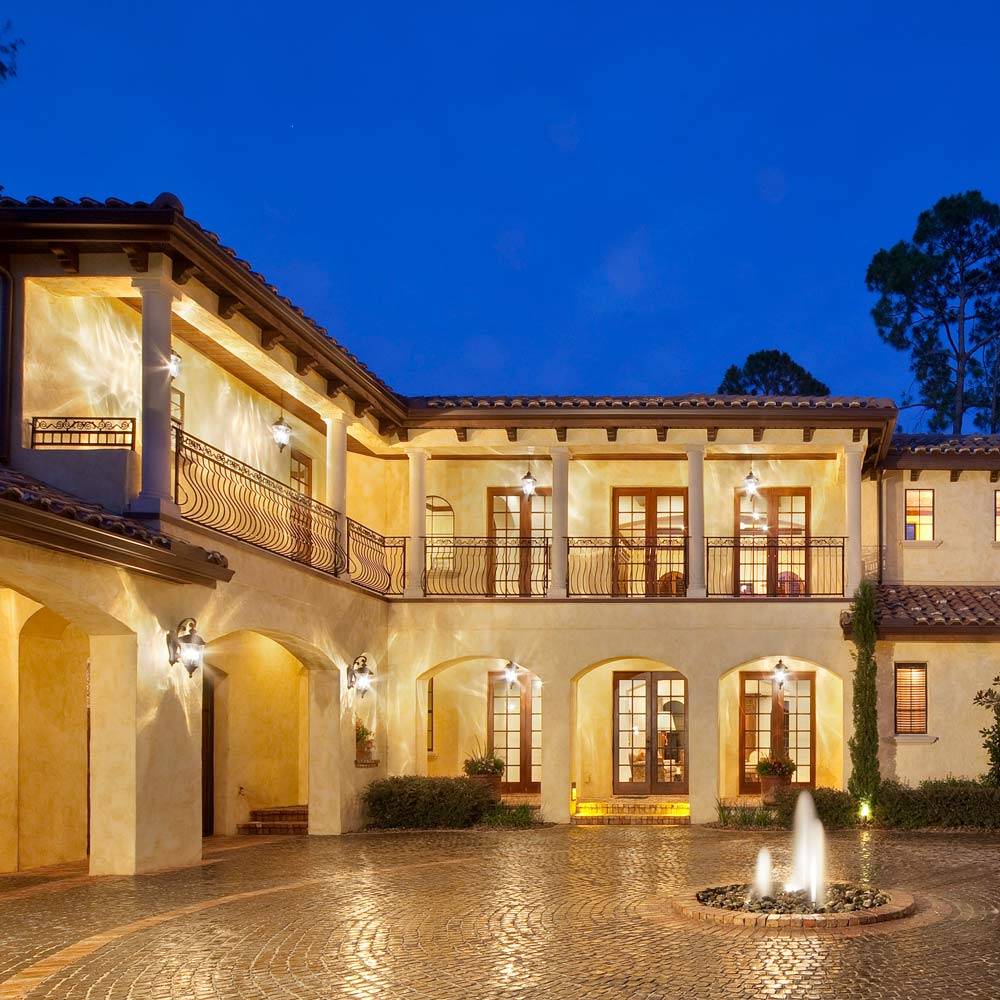 Carriage House Outdoor Glass Lantern Wall Light in Outside Area.