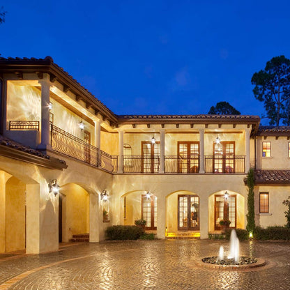 Carriage House Outdoor Glass Lantern Wall Light in Outside Area.