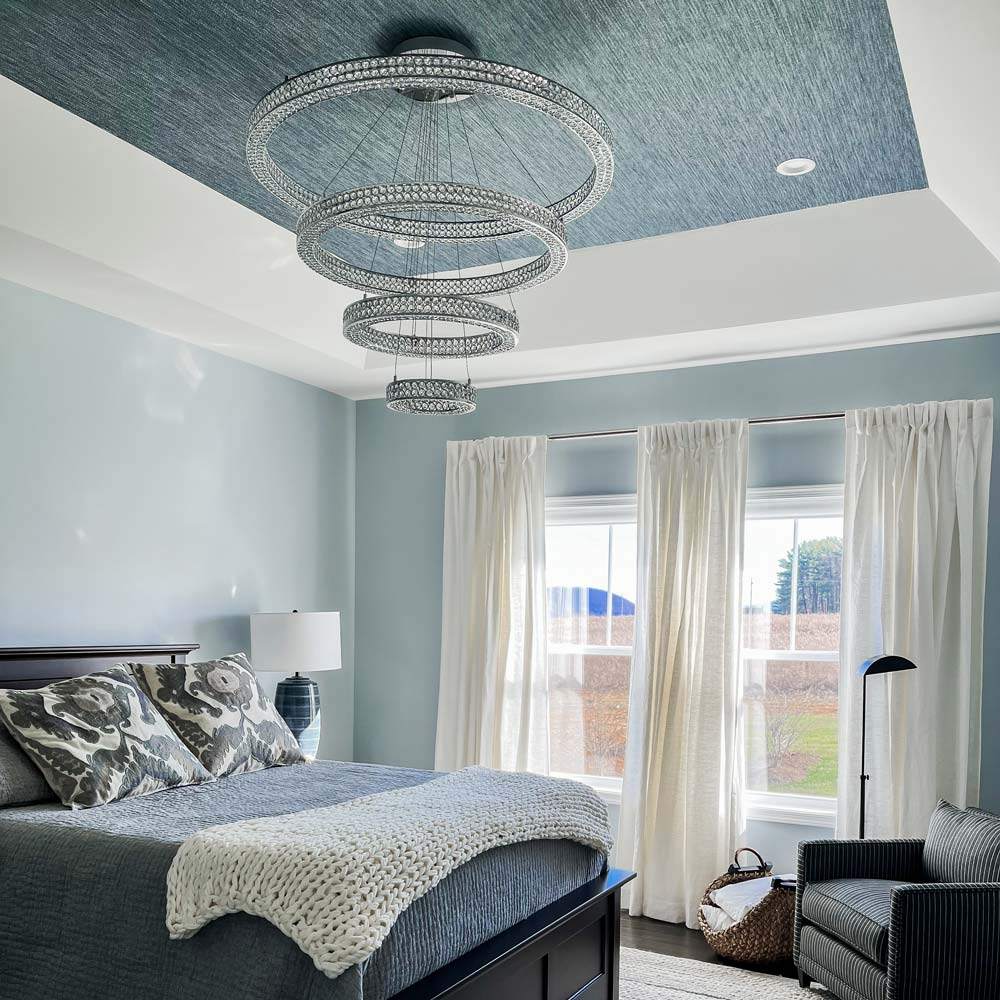 Eternity LED Chandelier in bedroom.