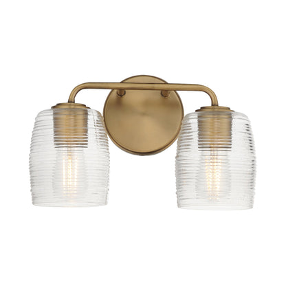Honey Bath Vanity Light in Natural Aged Brass (2-Light).