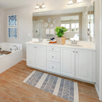 Malaga Bath Vanity Light in bathroom.