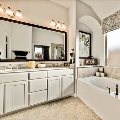 Malaga Bath Vanity Light in bathroom.