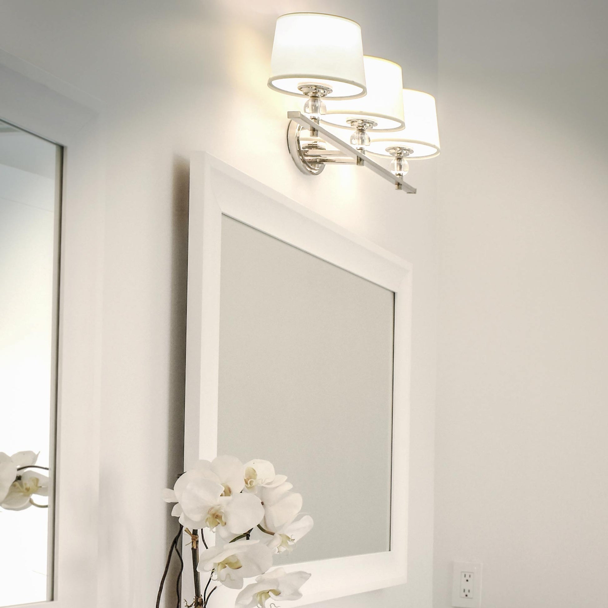 Rondo Bath Vanity Light in bathroom.