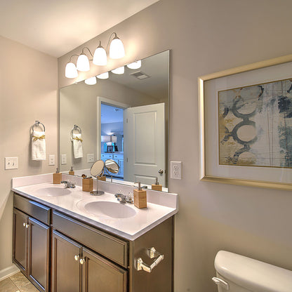 Stefan Bath Vanity Light in bathroom.