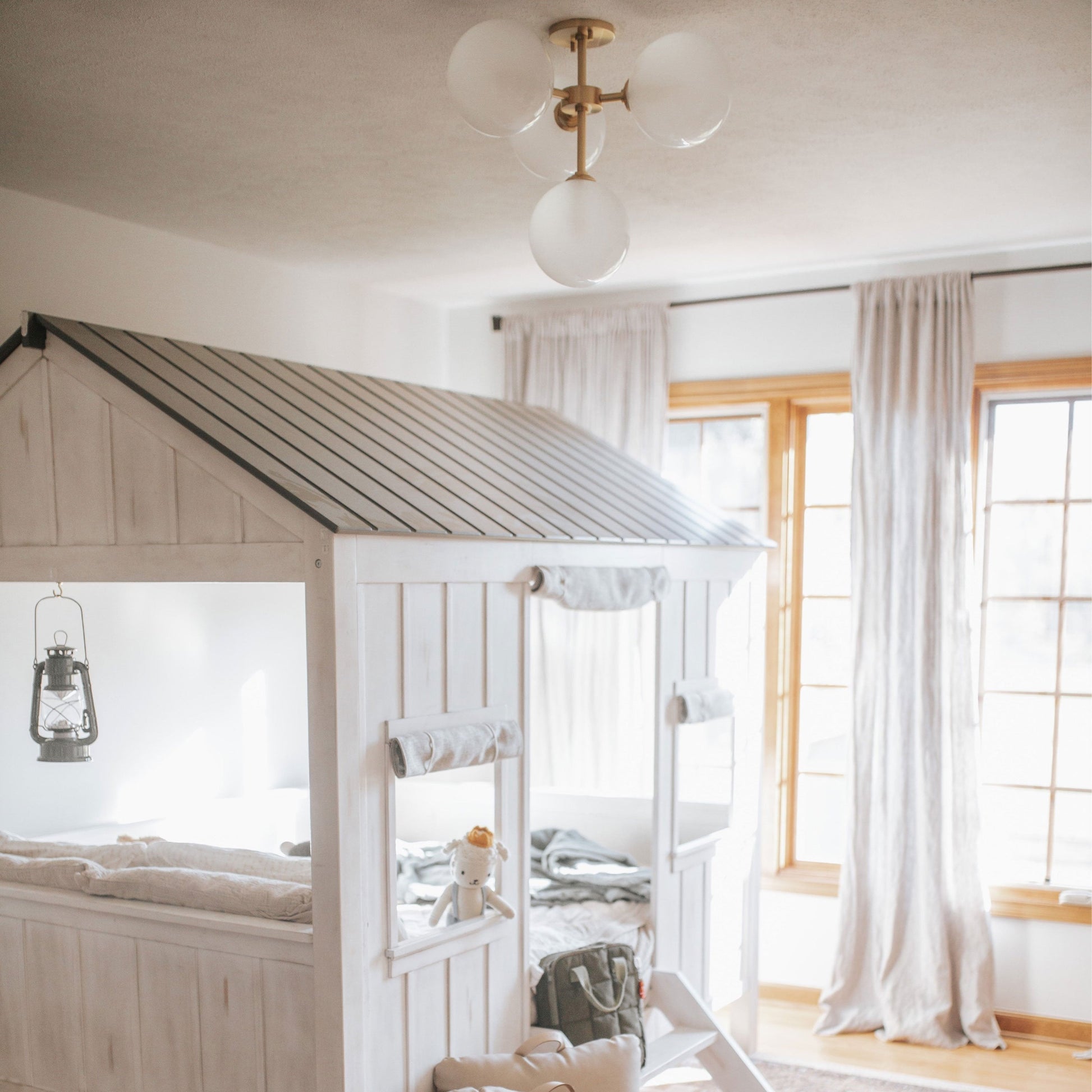 Ashleigh 4-Light LED Semi-Flush Mount Ceiling Light in bedroom.