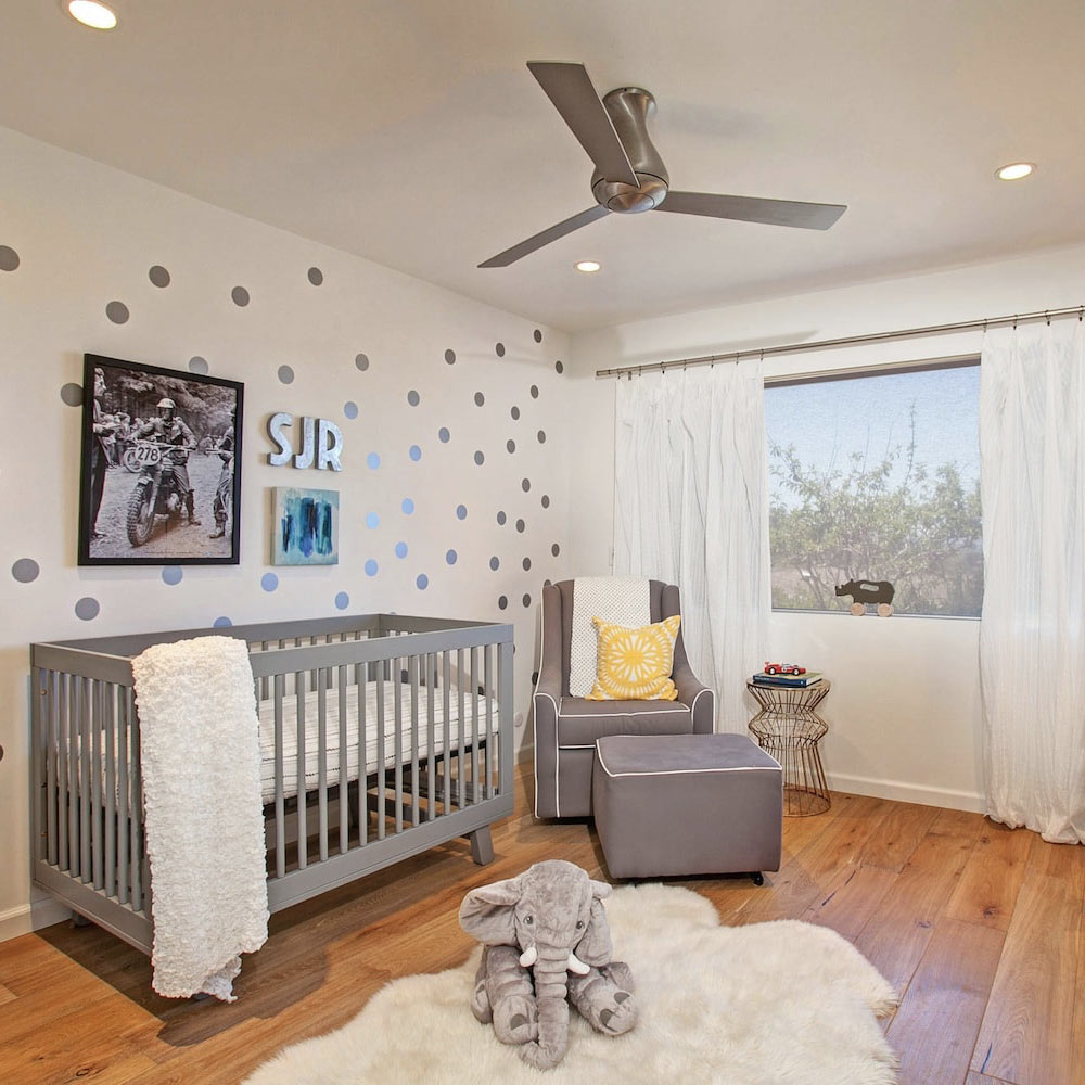 Altus 52-Inch Flush Mount Ceiling Fan in bedroom.