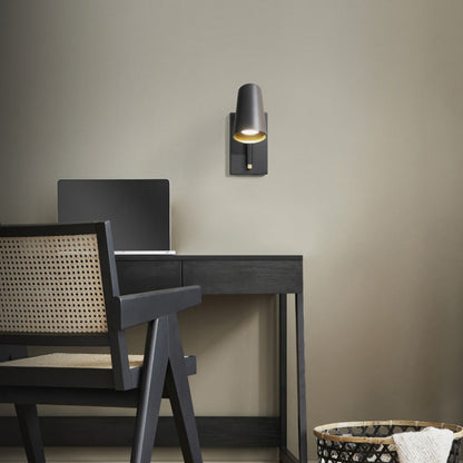 Stylus LED Adjustable Wall Light in Bedroom.