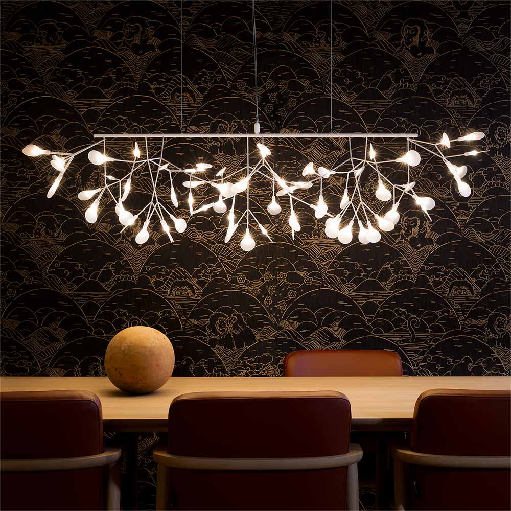 Heracleum III LED Linear Pendant Light in dining room.