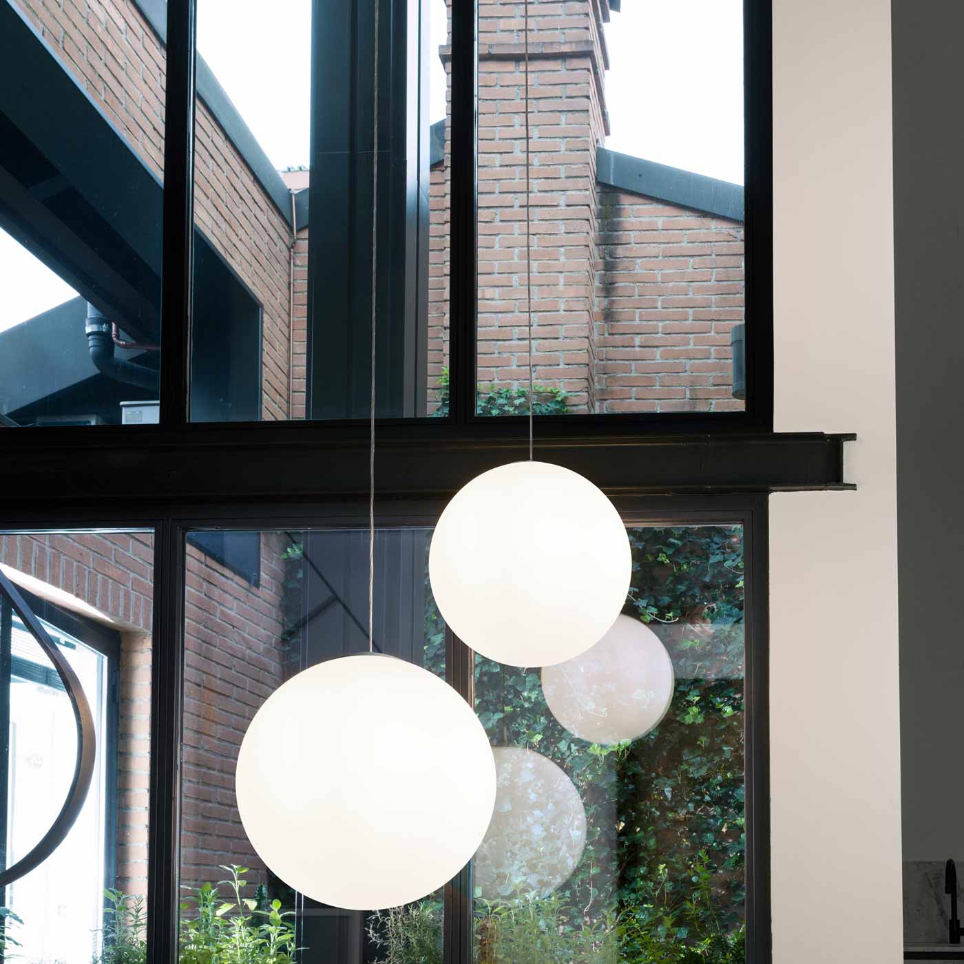 Asteroide Pendant Light in living room.
