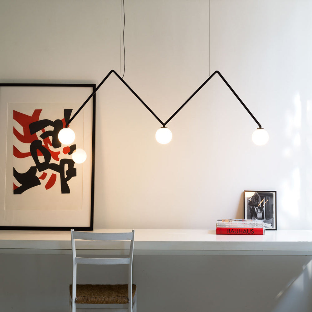 Dabliu Globe LED Pendant Light in living room.