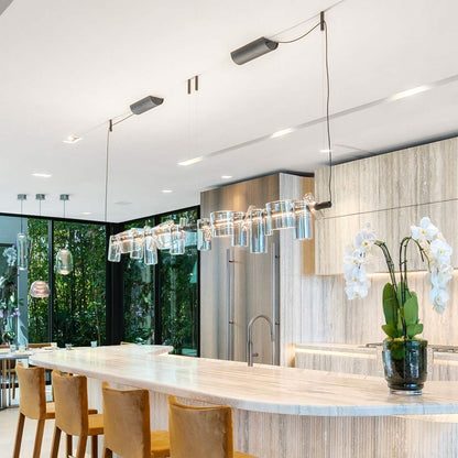 Dancing Glass LED Pendant Light in dining room.