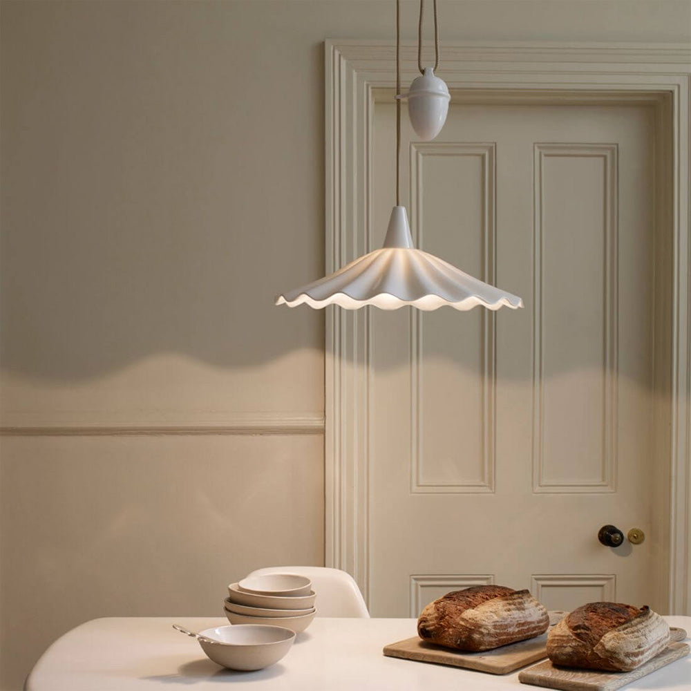 Christie Rise & Fall Pendant Light in dining room.