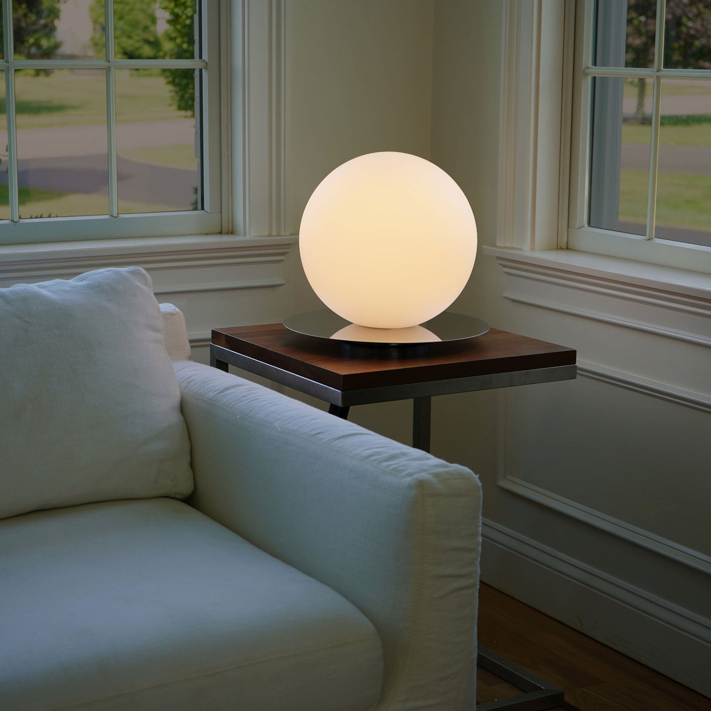 Bola Sphere LED Table Lamp in living room.