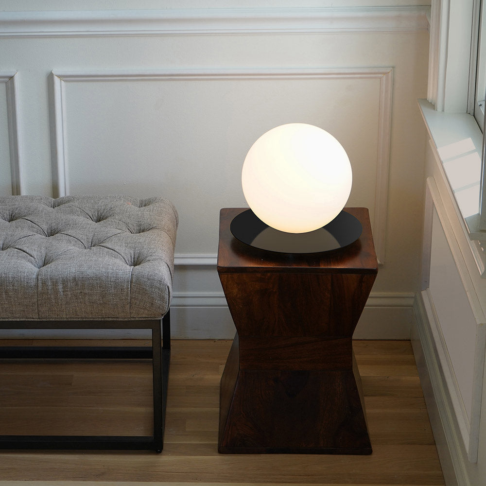 Bola Sphere LED Table Lamp in living room.