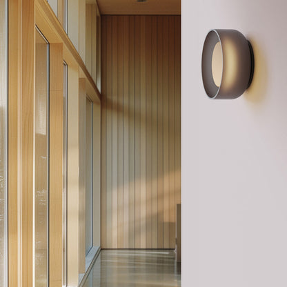 Totem LED Glass Wall Light in hallway.