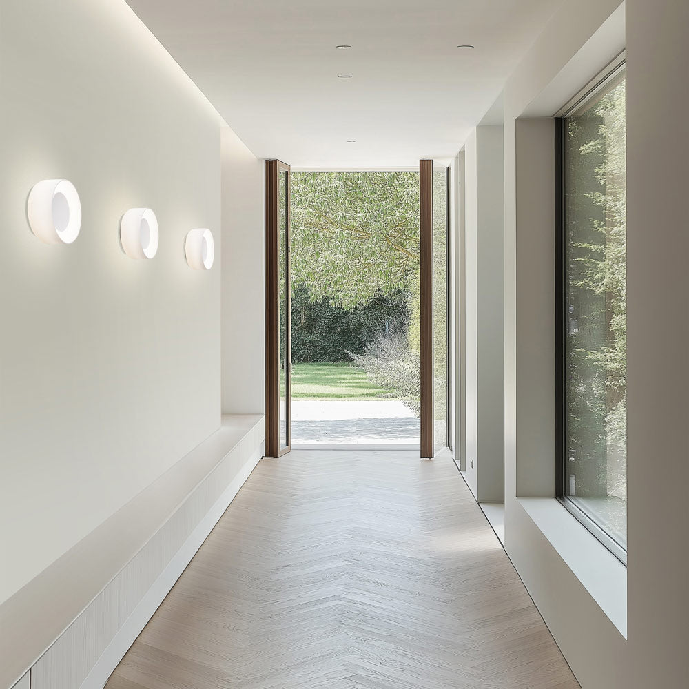 Totem LED Glass Wall Light in hallway.