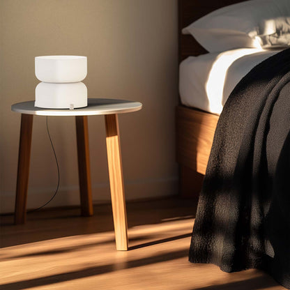 Totem Mini LED Table Lamp in bedroom.