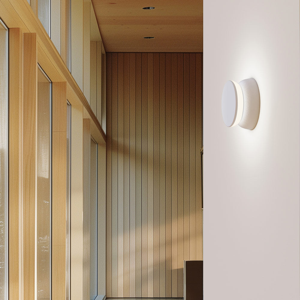 Totem Puck LED Wall Light in hallway.