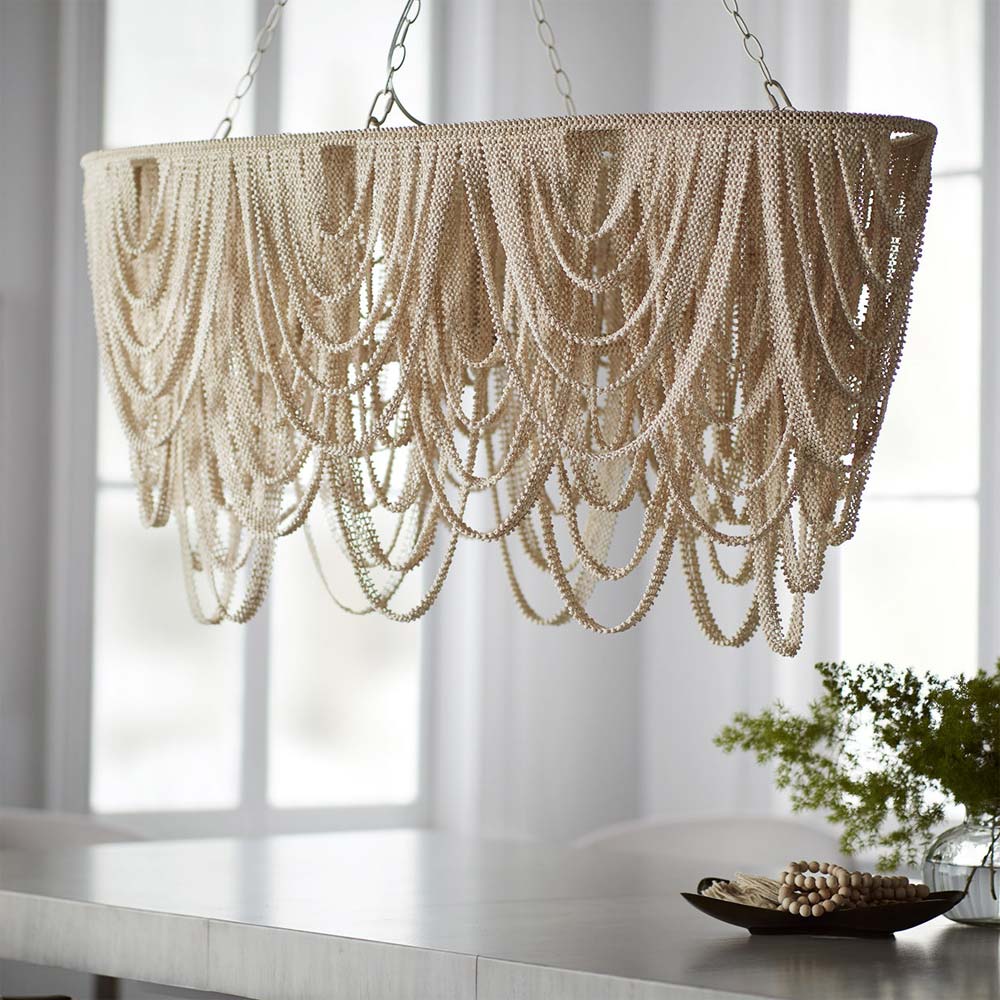 Selita Oval Chandelier in dining room.