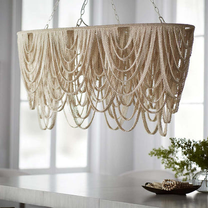 Selita Oval Chandelier in dining room.