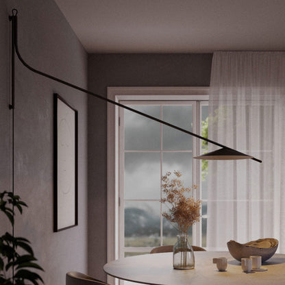 Glifo Plug-In LED Wall Light in dining room.