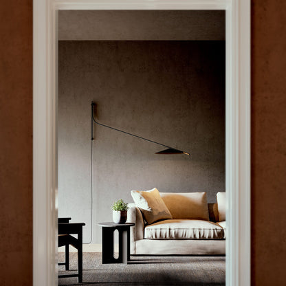 Glifo Plug-In LED Wall Light in living room.