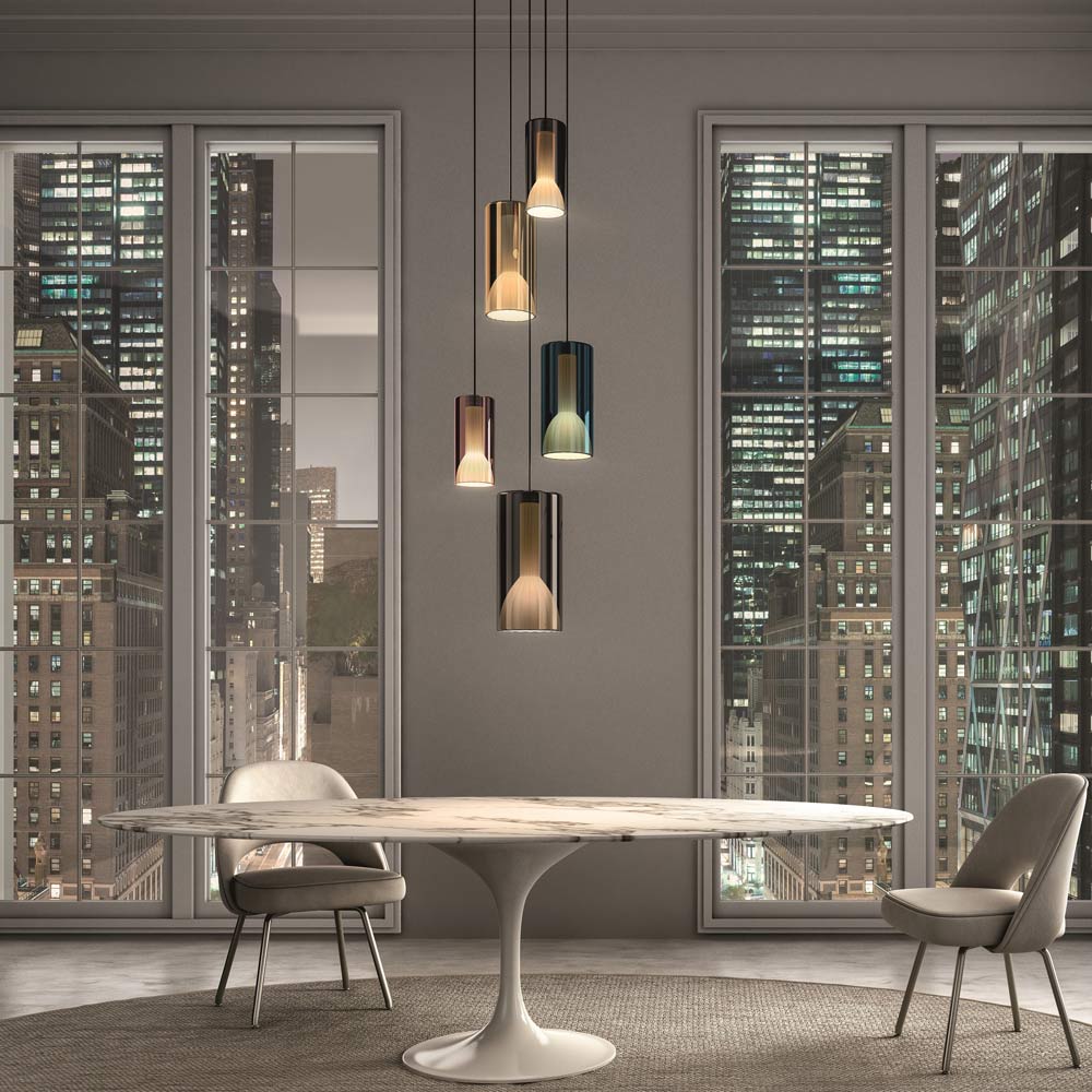 Lit Multi-Light Pendant Light in living room.