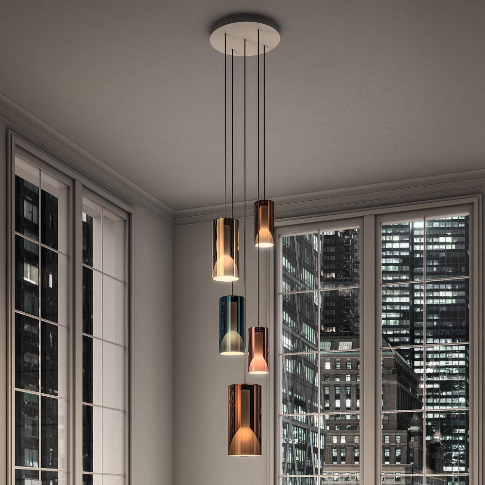 Lit Multi-Light Pendant Light in living room.