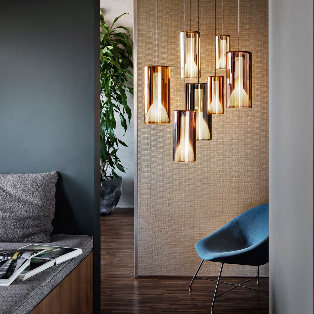 Lit Multi-Light Pendant Light in bed room.