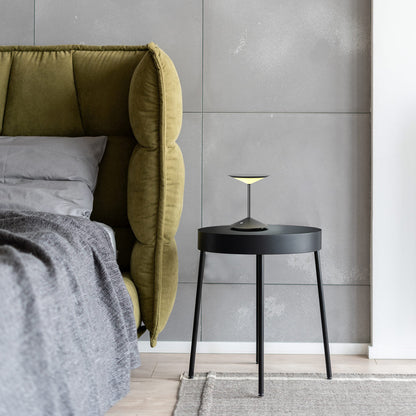Narciso LED Rechargeable Table Lamp in bedroom.