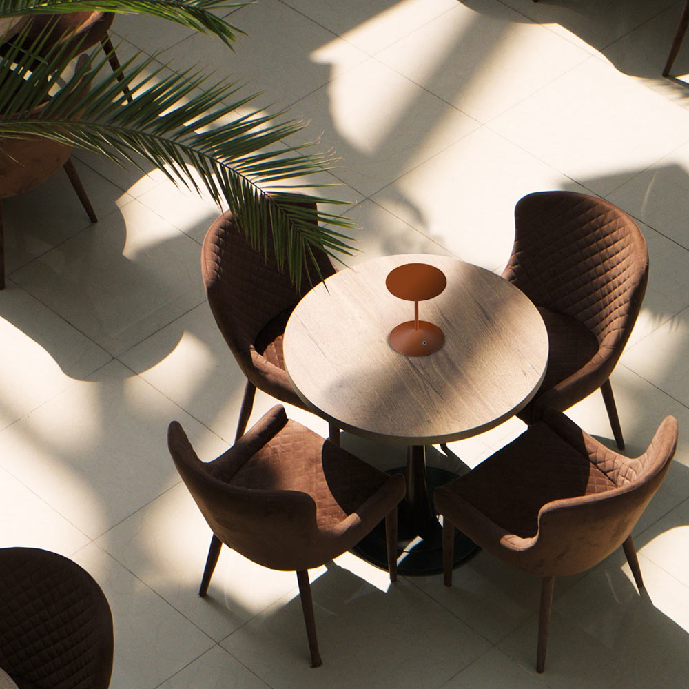 Narciso LED Rechargeable Table Lamp in cafe.